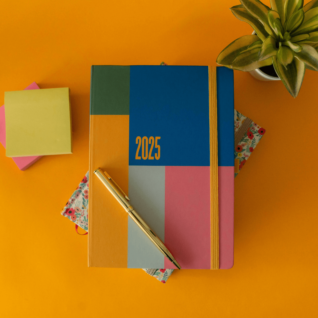 A multi coloured 2025 diary.