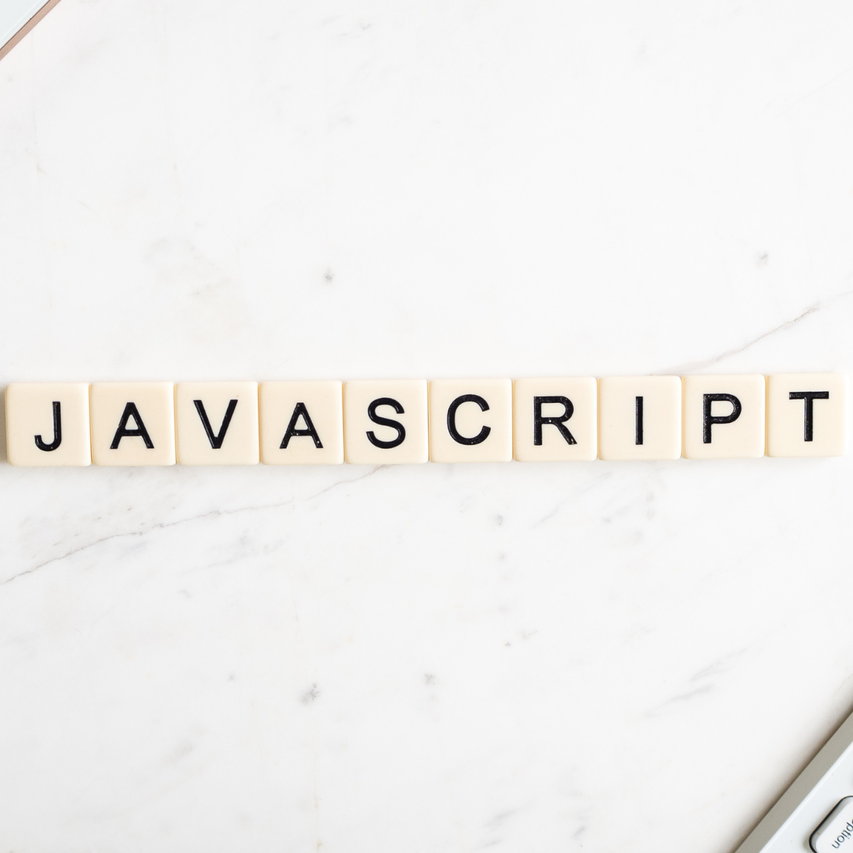 Scrabble letters that spell out JavaScript.