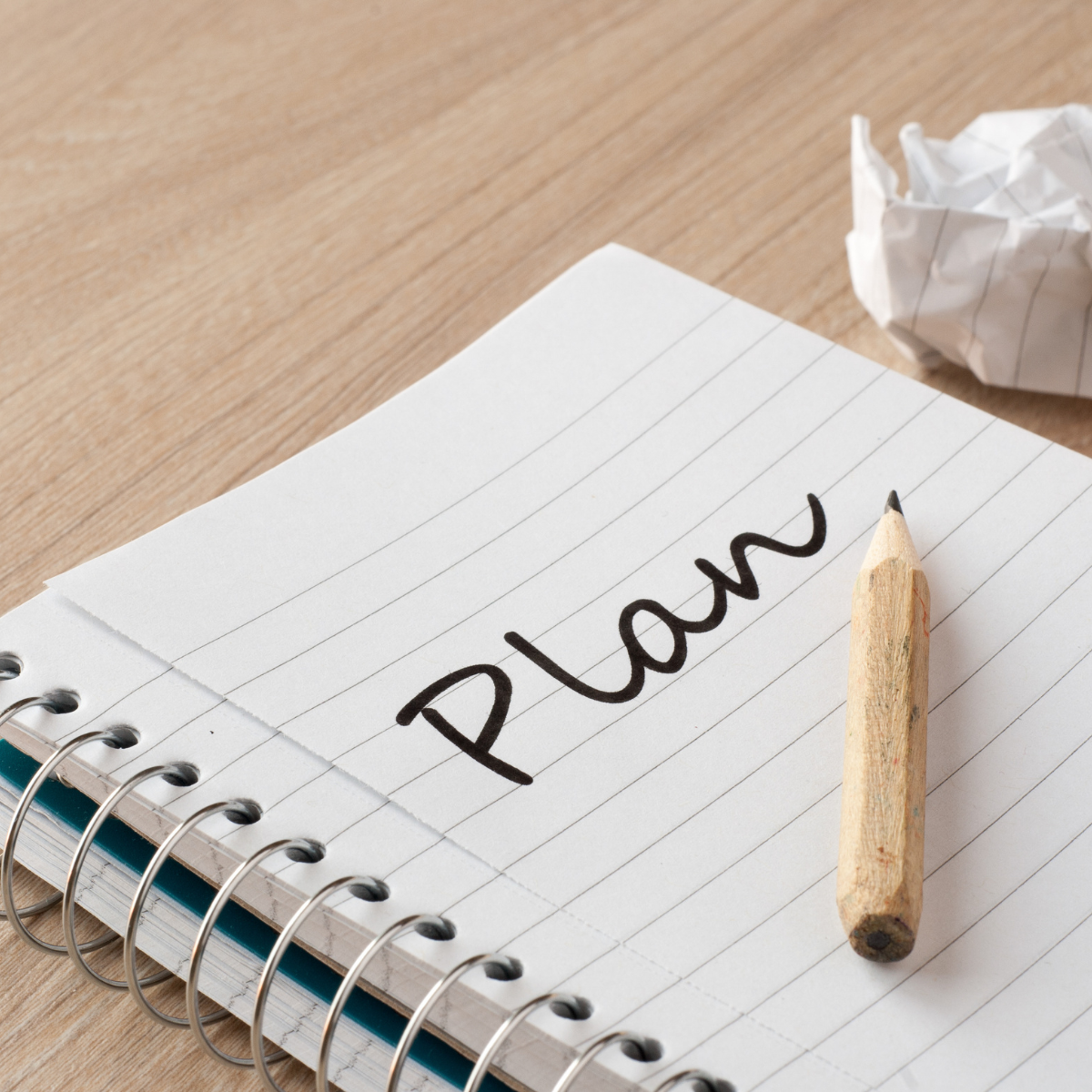A notepad that reads plan